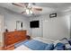 This bedroom features a large bed, closet, and dresser at 1816 Silver Birch Ln, Las Vegas, NV 89104
