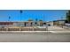 Inviting single-story home with a secure fence, desert landscape, and a well-maintained driveway at 1816 Silver Birch Ln, Las Vegas, NV 89104