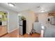 Spacious laundry room with washer, dryer, fridge and exterior access at 1816 Silver Birch Ln, Las Vegas, NV 89104