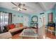 Inviting living space with hardwood floors, comfortable seating, and stylish interior elements at 1816 Silver Birch Ln, Las Vegas, NV 89104