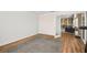 Bonus room leading to Gathering room with wood and carpet flooring at 2021 Summit Pointe Dr, Las Vegas, NV 89117