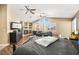 Beautiful main bedroom offering a built-in fireplace and shelving, plus large comfortable seating at 2021 Summit Pointe Dr, Las Vegas, NV 89117