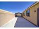Long backyard featuring a covered patio at 2099 Port Royal Dr, Laughlin, NV 89029