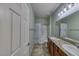 Well-lit bathroom featuring a dual sink vanity and a shower-tub combination at 2099 Port Royal Dr, Laughlin, NV 89029