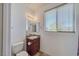 Bright bathroom with a single sink vanity and neutral finishes at 2099 Port Royal Dr, Laughlin, NV 89029