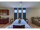 Cozy dining area adjacent to the kitchen, featuring stylish decor and ample natural light at 2099 Port Royal Dr, Laughlin, NV 89029