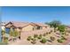 Charming home with tile roof, well-maintained landscaping, and secure fencing at 2099 Port Royal Dr, Laughlin, NV 89029