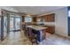Bright kitchen with granite countertops, bar stool seating and stainless steel appliances at 2099 Port Royal Dr, Laughlin, NV 89029