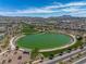 Aerial view of the community featuring a pond, parks, and surrounding residential area at 216 Callen Falls Ave # 1423, Henderson, NV 89011