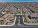 High aerial view of a townhome complex that is adjacent to a gated entrance at 216 Callen Falls Ave # 1423, Henderson, NV 89011
