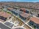Lovely aerial image showcasing a townhome community with pedestrian walkways and green spaces at 216 Callen Falls Ave # 1423, Henderson, NV 89011