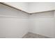 Walk-in closet with rod for hanging clothes, carpeted flooring, and neutral walls at 216 Callen Falls Ave # 1423, Henderson, NV 89011