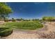 Landscaped community park with walking paths and expansive green space for recreation at 216 Callen Falls Ave # 1423, Henderson, NV 89011