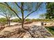 Landscaped community park featuring walking paths, rock features and shade trees at 216 Callen Falls Ave # 1423, Henderson, NV 89011