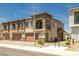 Lovely townhouse with stone accents, individual garages, and private balconies at 216 Callen Falls Ave # 1423, Henderson, NV 89011