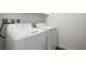 Laundry room with a modern washer and dryer set at 216 Callen Falls Ave # 1423, Henderson, NV 89011