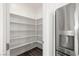 View of the well-organized walk-in pantry with ample shelving at 216 Callen Falls Ave # 1423, Henderson, NV 89011