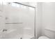 Modern tiled shower with glass enclosure and chrome fixtures at 216 Callen Falls Ave # 1423, Henderson, NV 89011