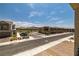 Exterior shot of attractive townhomes with beautiful landscaping in a suburban neighborhood in the sunshine at 216 Callen Falls Ave # 1423, Henderson, NV 89011