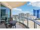 Relaxing balcony seating with panoramic city views under sunny skies, perfect for outdoor enjoyment at 222 Karen Ave # 3208, Las Vegas, NV 89109