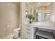 Bathroom with toilet, vanity with bench, and tiled floors at 222 Karen Ave # 3208, Las Vegas, NV 89109