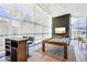Bright game room with a modern pool table, bar and lots of windows with shades for privacy and light control at 222 Karen Ave # 3208, Las Vegas, NV 89109