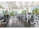 Large, bright fitness center with modern equipment, weights, and mirrored walls for a complete workout experience at 222 Karen Ave # 3208, Las Vegas, NV 89109