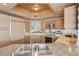 Modern kitchen featuring stainless steel appliances, a breakfast bar, and granite counters at 222 Karen Ave # 3208, Las Vegas, NV 89109