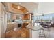 Modern kitchen featuring granite countertops, stainless steel appliances, and open layout to living area with great views at 222 Karen Ave # 3208, Las Vegas, NV 89109