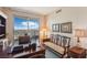 Office with desk, bench seating, and balcony overlooking city views at 222 Karen Ave # 3208, Las Vegas, NV 89109
