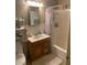 Bathroom featuring a single vanity, a framed mirror, a shower with a curtain, and tile flooring at 225 Dogwood St, Henderson, NV 89015