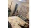 Bedroom with floral curtains and a closet with sliding doors filled with various items at 225 Dogwood St, Henderson, NV 89015