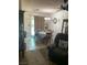 Open dining room features a chandelier and backyard access at 225 Dogwood St, Henderson, NV 89015