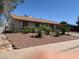 Single story home featuring desert landscaping, a low-sloping roof, and simple window design at 225 Dogwood St, Henderson, NV 89015