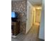 Hallway with a TV and decor at 225 Dogwood St, Henderson, NV 89015
