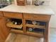 Kitchen cabinets featuring pull-out shelves to provide convenience and organized storage at 225 Dogwood St, Henderson, NV 89015