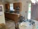 Bright kitchen with wood cabinets and a breakfast nook at 225 Dogwood St, Henderson, NV 89015