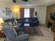 Inviting living room with comfortable seating and natural light at 225 Dogwood St, Henderson, NV 89015