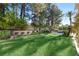 Expansive backyard featuring lush green grass and manicured landscaping for outdoor enjoyment and relaxation at 2346 Villandry Ct, Henderson, NV 89074