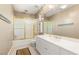 Well-lit bathroom features a shower-tub combo and a sleek vanity at 2346 Villandry Ct, Henderson, NV 89074