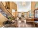 Elegant living room with fireplace, hardwood floors, and ample natural light at 2346 Villandry Ct, Henderson, NV 89074