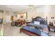 Spacious main bedroom featuring ceiling fan, sitting area, and traditional furnishings at 2346 Villandry Ct, Henderson, NV 89074