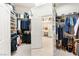 Well-organized walk-in closet with ample storage and adjacent vanity area at 2346 Villandry Ct, Henderson, NV 89074