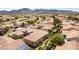 High aerial shot showing a neighborhood, with mountains in the distance at 2373 Ozark Plateau Dr, Henderson, NV 89044