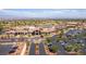 An aerial view of a complex with extensive parking and beautiful desert landscape at 2373 Ozark Plateau Dr, Henderson, NV 89044