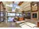 A spacious lobby with high ceilings, skylights, and comfortable seating areas at 2373 Ozark Plateau Dr, Henderson, NV 89044