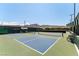Pickleball courts featuring multiple blue and green playing surfaces, offering a fun and active recreational space at 2373 Ozark Plateau Dr, Henderson, NV 89044