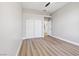 The bedroom features wood floors, closet and entrance to the rest of the house at 2409 Alpine Meadows Ave, Henderson, NV 89074