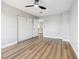 The bedroom features wood floors, closet and entrance to the rest of the house at 2409 Alpine Meadows Ave, Henderson, NV 89074