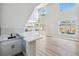 Living room features a wet bar, high ceilings and views of the pool at 2409 Alpine Meadows Ave, Henderson, NV 89074